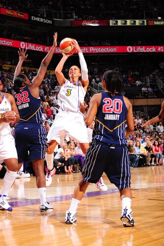 PHOENIX - OCTOBER 1: Diana Taurasi #3 of the Phoenix Mercury puts a shot up over Ebony Hoffman #32 of the Indiana Fever in Game two of the WNBA Finals played on October 1, 2009 at U.S. Airways Center in Phoenix, Arizona. <br /><br /><span class="help">(Photo by P. A. Molumby/NBAE via Getty Images)</span>