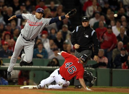 BOSTON - OCTOBER 02:  Jacoby Ellsbury #46 of the Boston Red Sox steals third safely as Jhonny Peralta #2 of the Cleveland Indians is unable to grab an errant throw in the first inning on October 2, 2009 at Fenway Park in Boston, Massachusetts. Ellsbury scored on the play. <br /><br /><span class="help">(Photo by Elsa/Getty Images)</span>