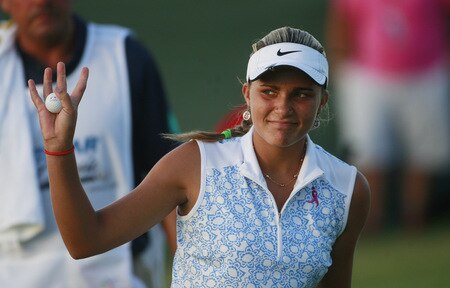PRATTVILLE, AL - OCTOBER 2:  Amateur golfer Alexis Thompson, 14, waves on the 18th green during second round play in the Navistar LPGA Classic at the Robert Trent Jones Golf Trail at Capitol Hill on October 2, 2009 in  Prattville, Alabama.  <br /><br /><span class="help">(Photo by Dave Martin/Getty Images)</span>