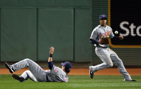 BOSTON - OCTOBER 02:  Michael Brantley #23 of the Cleveland Indians chases after the ball that Shin-Soo Choo #17 missed against the Boston Red Sox on October 2, 2009 at Fenway Park in Boston, Massachusetts.  <br /><br /><span class="help">(Photo by Elsa/Getty Images)</span>