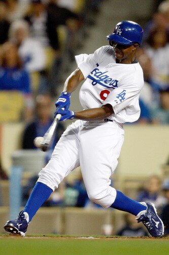 LOS ANGELES, CA - OCTOBER 03: Juan Pierre #9 of the Los Angeles Dodgers hits against the Colorodo Rockies on October 3, 2009 in Los Angeles, California. <br /><br /><span class="help">(Photo by Jacob de Golish/Getty Images)</span>