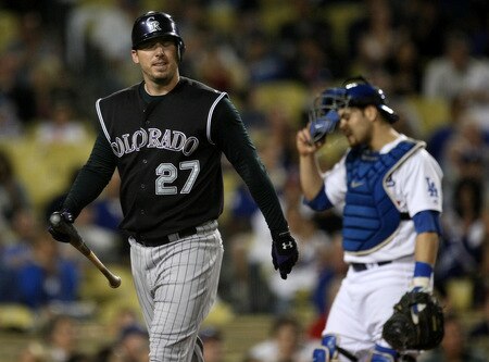 LOS ANGELES, CA - OCTOBER 03: Garrett Atkins #27 of the Colorado Rockies reacts after striking out in the second inning against the Los Angeles Dodgers on October 3, 2009 at Dodger Stadium in Los Angeles, California. <br /><br /><span class="help">(Photo by Stephen Dunn/Getty Images)</span>