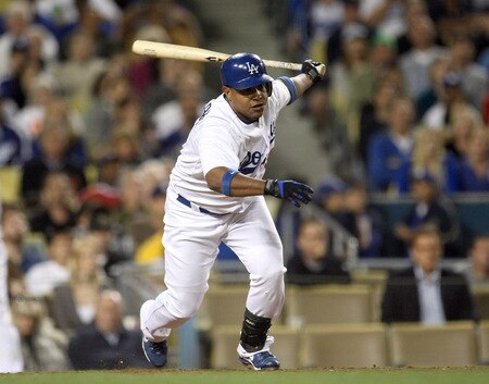 LOS ANGELES, CA - OCTOBER 03: Ronnie Belliard #3 of the Los Angeles Dodgers hits an RBI single in the seventh inning for the Dodgers first run in the game against the Colorado Rockies on October 3, 2009 at Dodger Stadium in Los Angeles, California. <br /><br /><span class="help">(Photo by Stephen Dunn/Getty Images)</span>