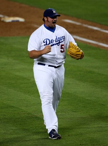 LOS ANGELES, CA - OCTOBER 03:  Pitcher Jonathan Broxton #51 of the Los Angeles Dodgers celebrates after getting the final out against the Colorado Rockies on October 3, 2009 at Dodger Stadium in Los Angeles, California.  The Dodgers won 5-0 to clinch the National League West.  <br /><br /><span class="help">(Photo by Stephen Dunn/Getty Images)</span>