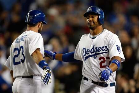 LOS ANGELES, CA - OCTOBER 03: Casey Blake #23 and Matt Kemp #27 of the Los Angeles Dodgers celebrate after being batted in against the Colorado Rockie on October 3, 2009 in Los Angeles, California.  <br /><br /><span class="help">(Photo by Jacob de Golish/Getty Images)</span>