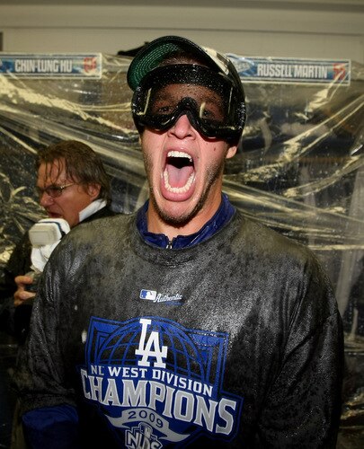 LOS ANGELES - OCTOBER 3:  Pitcher Clayton Kershaw of the Los Angeles Dodgers celebrates after the game with the Colorado Rockies on October 3, 2009 at Dodger Stadium in Los Angeles, California.  The Dodgers won 5-0 to clinch the National League West.  <br /><br /><span class="help">(Photo by Stephen Dunn/Getty Images)</span>