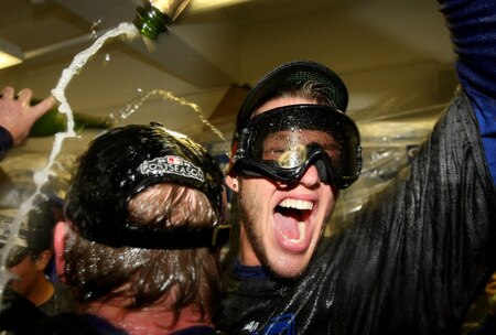 LOS ANGELES, CA - OCTOBER 03:  Pitcher Clayton Kershaw of the Los Angeles Dodgers celebrates after the game with the Colorado Rockies on October 3, 2009 at Dodger Stadium in Los Angeles, California.  The Dodgers won 5-0 to clinch the National League West.  <br /><br /><span class="help">(Photo by Stephen Dunn/Getty Images)</span>