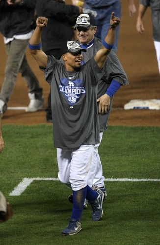 LOS ANGELES, CA - OCTOBER 03:   Rafael Furcal #15 of the Los Angeles Dodgers celebrates after the game with the Colorado Rockies on October 3, 2009 at Dodger Stadium in Los Angeles, California.  The Dodgers won 5-0 to clinch the National League West.  <br /><br /><span class="help">(Photo by Stephen Dunn/Getty Images)</span>