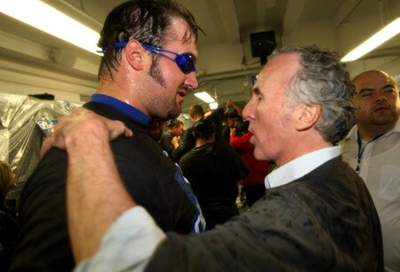 LOS ANGELES, CA - OCTOBER 03:  Pitcher Jonathan Broxton #51 of the Los Angeles Dodgers greets owner Frank McCort as they celebrate after the game against the Colorado Rockies on October 3, 2009 at Dodger Stadium in Los Angeles, California.  The Dodgers won 5-0 to clinch the National League West.  <br /><br /><span class="help">(Photo by Stephen Dunn/Getty Images)</span>