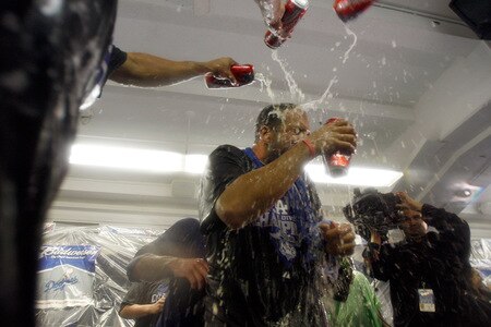 LOS ANGELES, CA - OCTOBER 03: Matt Kemp #27 of the Los Angeles Dodgers gets beer poured on his face as celebration after winning the National League West against the Colorado Rockies on October 3, 2009 in Los Angeles, California.  <br /><br /><span class="help">(Photo by Jacob de Golish/Getty Images)</span>