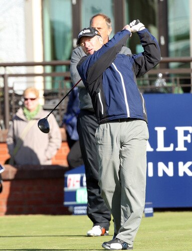 CARNOUSTIE, SCOTLAND - OCTOBER 04: Steve Waugh of Australia tees off at the 1st hole watched by his playing amateur partner Sir Steve Redgrave of England during the third round of the Alfred Dunhill Links Championship at Carnoustie, on October 4, 2009 in Kingsbarns, Scotland. The third round was postponed on saturday due to gale force winds.  <br /><br /><span class="help">(Photo by David Cannon/Getty Images)</span>