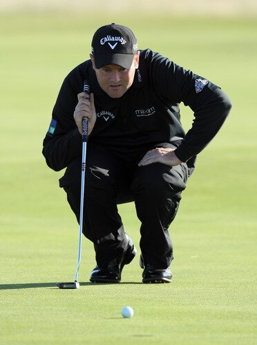 CARNOUSTIE, SCOTLAND - OCTOBER 04:  Alastair Forsyth of Scotland lines up a putt at the 14th hole during the third round of the Alfred Dunhill Links Championship at Carnoustie, on October 4, 2009 in Kingsbarns, Scotland. The third round was postponed on saturday due to gale force winds.  <br /><br /><span class="help">(Photo by David Cannon/Getty Images)</span>