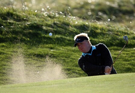 CARNOUSTIE, SCOTLAND - OCTOBER 04:  Ross McGowan of England plays his thrid shot at the 3rd hole during the third round of the Alfred Dunhill Links Championship at Carnoustie, on October 4, 2009 in Kingsbarns, Scotland. The third round was postponed on saturday due to gale force winds.  <br /><br /><span class="help">(Photo by David Cannon/Getty Images)</span>