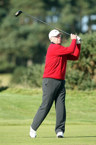 CARNOUSTIE, SCOTLAND - OCTOBER 04:  Sir Bobby Charlton of England plays his tee shot at the 15th hole during the third round of the Alfred Dunhill Links Championship at Carnoustie Golf Links on October 4, 2009 in Carnoustie, Scotland. The third round was postponed on saturday due to gale force winds.  <br /><br /><span class="help">(Photo by David Cannon/Getty Images)</span>