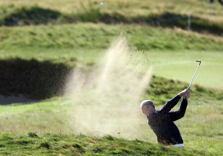 CARNOUSTIE, SCOTLAND - OCTOBER 04:  Wallace Booth of Scotland plays his second shot at the 15th hole during the third round of the Alfred Dunhill Links Championship at Carnoustie Golf Links on October 4, 2009 in Carnoustie, Scotland. The third round was postponed on saturday due to gale force winds.  <br /><br /><span class="help">(Photo by David Cannon/Getty Images)</span>