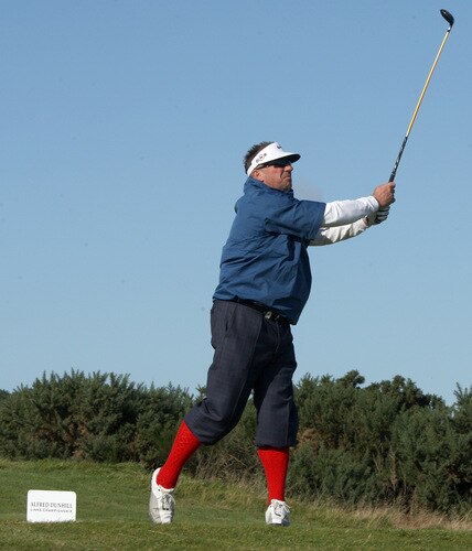 CARNOUSTIE, SCOTLAND - OCTOBER 04:  Sir Ian Botham of England plays his tee shot at the 15th hole during the third round of the Alfred Dunhill Links Championship at Carnoustie Golf Links on October 4, 2009 in Carnoustie, Scotland. The third round was postponed on saturday due to gale force winds.  <br /><br /><span class="help">(Photo by David Cannon/Getty Images)</span>