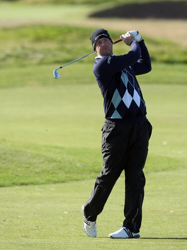 CARNOUSTIE, SCOTLAND - OCTOBER 04:  Peter Hanson of Sweden plays his second shot at the 15th hole during the third round of the Alfred Dunhill Links Championship at Carnoustie Golf Links on October 4, 2009 in Carnoustie, Scotland. The third round was postponed on saturday due to gale force winds.  <br /><br /><span class="help">(Photo by David Cannon/Getty Images)</span>