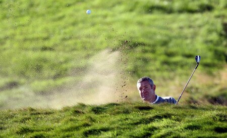 CARNOUSTIE, SCOTLAND - OCTOBER 04:  Gavin Hastings of Scotland plays his third shot at the 14th hole during the third round of the Alfred Dunhill Links Championship at Carnoustie Golf Links on October 4, 2009 in Carnoustie, Scotland. The third round was postponed on saturday due to gale force winds.  <br /><br /><span class="help">(Photo by David Cannon/Getty Images)</span>