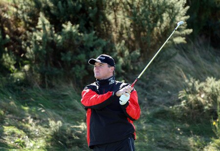 CARNOUSTIE, SCOTLAND - OCTOBER 04:  Paul Lawrie of Scotland plays his second shot at the 15th hole during the third round of the Alfred Dunhill Links Championship at Carnoustie Golf Links on October 4, 2009 in Carnoustie, Scotland. The third round was postponed on saturday due to gale force winds.  <br /><br /><span class="help">(Photo by David Cannon/Getty Images)</span>