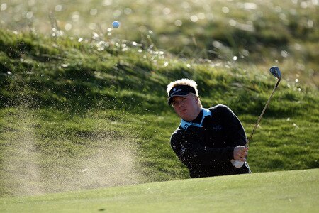 CARNOUSTIE, SCOTLAND - OCTOBER 04:  Ross McGowan of England plays his thrid shot at the 3rd hole during the third round of the Alfred Dunhill Links Championship at Carnoustie Golf Links on October 4, 2009 in Carnoustie, Scotland. The third round was postponed on saturday due to gale force winds.  <br /><br /><span class="help">(Photo by David Cannon/Getty Images)</span>