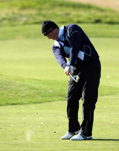 CARNOUSTIE, SCOTLAND - OCTOBER 04:  Peter Hanson of Sweden plays his second shot at the 15th hole during the third round of the Alfred Dunhill Links Championship at Carnoustie Golf Links on October 4, 2009 in Carnoustie, Scotland. The third round was postponed on saturday due to gale force winds.  <br /><br /><span class="help">(Photo by David Cannon/Getty Images)</span>
