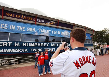 MINNEAPOLIS, MN - OCTOBER 4: Peter Ryan of New Prague, MN, takes a photo of his parents Rosie and Ron Ryan in front of the Hubert H. Humphrey Metrodome before the start of the Minnesota Twins' game against the Kansas City Royals on October 4, 2009 in Minneapolis, Minnesota. This will be the last regular season game at the Dome for the Twins. <br /><br /><span class="help">(Photo by Genevieve Ross/Getty Images)</span>
