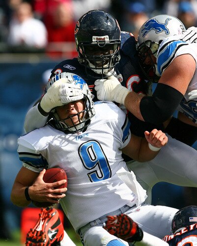 CHICAGO - OCTOBER 04: Alex Brown #96 of the Chicago Bears sacks Matthew Stafford #9 of the Detroit Lions on October 4, 2009 at Soldier Field in Chicago, Illinois. <br /><br /><span class="help">(Photo by Jonathan Daniel/Getty Images)</span>