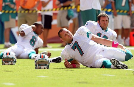 MIAMI - OCTOBER 04:  Quarterbacks Chad Henne #7, Tyler Thigpen #16 and Pat White #6 of the Miami Dolphins stretch during pre-game as Henne prepares to make his first start against the Buffalo Bills at Land Shark Stadium on October 4, 2009 in Miami, Florida.  <br /><br /><span class="help">(Photo by Doug Benc/Getty Images)</span>