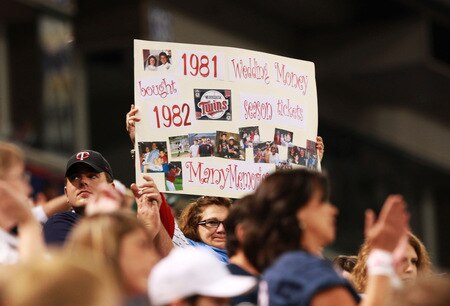 MINNEAPOLIS, MN - OCTOBER 4: A Minnesota Twins fan holds a sign sharing her memories of the Hubert H. Humphrey Metrodome before the start of the Minnesota Twins' game against the Kansas City Royals on October 4, 2009 in Minneapolis, Minnesota. This will be the last regular season game at the Dome for the Twins. <br /><br /><span class="help">(Photo by Genevieve Ross/Getty Images)</span>