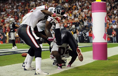 HOUSTON - OCTOBER 04:  Running back Steve Slaton #20 of the Houston Texans celebrates a touchdown against the Oakland Raiders at Reliant Stadium on October 4, 2009 in Houston, Texas.  <br /><br /><span class="help">(Photo by Ronald Martinez/Getty Images)</span>
