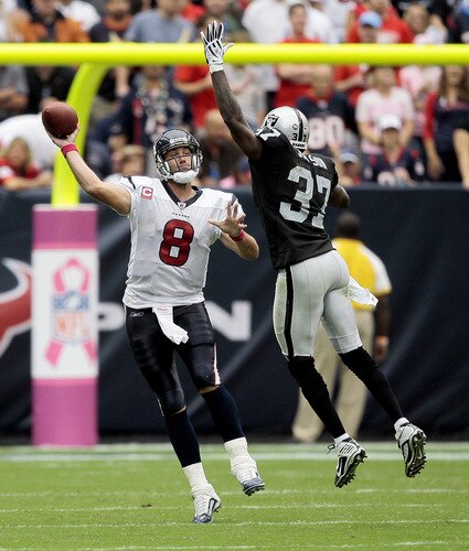 HOUSTON - OCTOBER 04:  Quarterback Matt Schaub #8 of the Houston Texans throws over cornerback Chris Johnson #37 of the Oakland Raider in the fourth quarter at Reliant Stadium on October 4, 2009 in Houston, Texas.  <br /><br /><span class="help">(Photo by Bob Levey/Getty Images)</span>