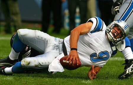 CHICAGO - OCTOBER 04: Matthew Stafford #9 of the Detroit Lions yells as he is sacked by Adewale Ogunleye #93 of the Chicago Bears on October 4, 2009 at Soldier Field in Chicago, Illinois. The Bears defeated the Lions 48-24. <br /><br /><span class="help">(Photo by Jonathan Daniel/Getty Images)</span>