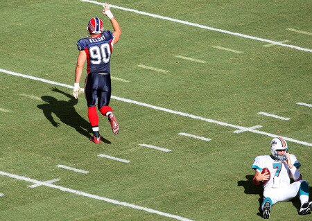 MIAMI - OCTOBER 04:  Defensive end Chris Kelsay #90 of the Buffalo Bills celebrates after sacking quarterback Chad Henne #7 of the Miami Dolphins at Land Shark Stadium on October 4, 2009 in Miami, Florida.  <br /><br /><span class="help">(Photo by Doug Benc/Getty Images)</span>