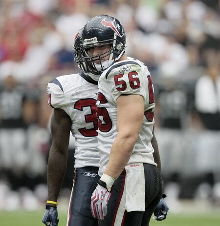 HOUSTON - OCTOBER 04:  Linebacker Brian Cushing #56 of the Houston Texans looks back at tight-end Zach Miller of her Oakland Raiders after delivering a hard hit in the fourth quarter at Reliant Stadium on October 4, 2009 in Houston, Texas.  <br /><br /><span class="help">(Photo by Bob Levey/Getty Images)</span>
