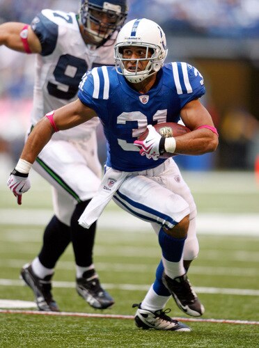 INDIANAPOLIS - OCTOBER 04:  Donald Brown #31 of the Indianapolis Colts runs with the ball during the NFL game against the Seattle Seahawks at Lucas Oil Stadium on October 4, 2009 in Indianapolis, Indiana. The Colts won 34-17.  <br /><br /><span class="help">(Photo by Andy Lyons/Getty Images)</span>