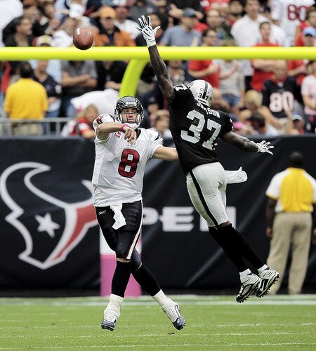 HOUSTON - OCTOBER 04:  Quarterback Matt Schaub #8 of the Houston Texans throws over cornerback Chris Johnson #37 of the Oakland Raider in the fourth quarter at Reliant Stadium on October 4, 2009 in Houston, Texas.  <br /><br /><span class="help">(Photo by Bob Levey/Getty Images)</span>