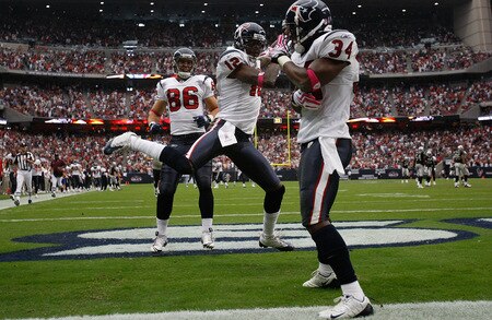 HOUSTON - OCTOBER 04:  Jacoby Jones #12 of the Houston Texans celebrates a kickoff return for a touchdown with James Casey #86 and Dominique Barber #34 during play against the Oakland Raiders at Reliant Stadium on October 4, 2009 in Houston, Texas.  <br /><br /><span class="help">(Photo by Ronald Martinez/Getty Images)</span>
