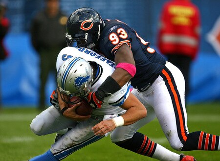 CHICAGO - OCTOBER 04: Adewale Ogunleye #93 of the Chicago Bears sacks Matthew Stafford #9 of the Detroit Lions on October 4, 2009 at Soldier Field in Chicago, Illinois. The Bears defeated the Lions 48-24. <br /><br /><span class="help">(Photo by Jonathan Daniel/Getty Images)</span>