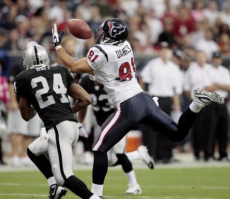 HOUSTON - OCTOBER 04:  Tight-end Owen Daniels #81 of the Houston Texans can't make the catch as he is defended by safety Michael Huff #24 of the Oakland Raiders at Reliant Stadium on October 4, 2009 in Houston, Texas.  <br /><br /><span class="help">(Photo by Bob Levey/Getty Images)</span>