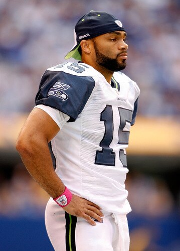 INDIANAPOLIS - OCTOBER 04:  Seneca Wallace #15 of the Seattle Seahawks looks on during the NFL game against the Indianapolis Colts at Lucas Oil Stadium on October 4, 2009 in Indianapolis, Indiana.  <br /><br /><span class="help">(Photo by Andy Lyons/Getty Images)</span>