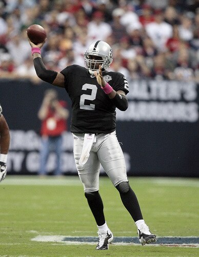 HOUSTON - OCTOBER 04:  Quarterback JeMarcus Russell #2 of the Oakland Raiders throws a pass downfield at Reliant Stadium on October 4, 2009 in Houston, Texas.  <br /><br /><span class="help">(Photo by Bob Levey/Getty Images)</span>