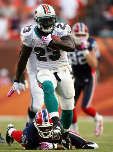 MIAMI - OCTOBER 04:  Running back Ronnie Brown #23 of the Miami Dolphins runs against the Buffalo Bills at Land Shark Stadium on October 4, 2009 in Miami, Florida.  <br /><br /><span class="help">(Photo by Marc Serota/Getty Images)</span>