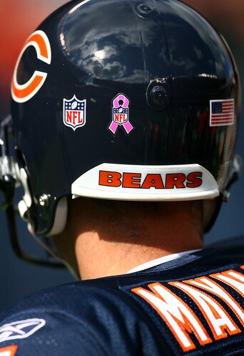 CHICAGO - OCTOBER 04:  A breast cancer awareness sticker is displayed on the back of the helmut of Brad Maynard #4 of the Chicago Bears in honor of breast cancer awareness month during a game against the Detroit Lions on October 4, 2009 at Soldier Field in Chicago, Illinois. The Bears defeated the Lions 48-24. <br /><br /><span class="help">(Photo by Jonathan Daniel/Getty Images)</span>