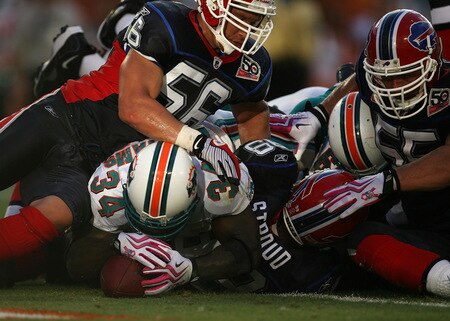 MIAMI - OCTOBER 04:  Running back Ricky Williams #34 of the Miami Dolphins recovers his own fumble in the end-zone for a touchdown against the Buffalo Bills at Land Shark Stadium on October 4, 2009 in Miami, Florida. The Dolphins defeated the Bills 38-10.  <br /><br /><span class="help">(Photo by Doug Benc/Getty Images)</span>