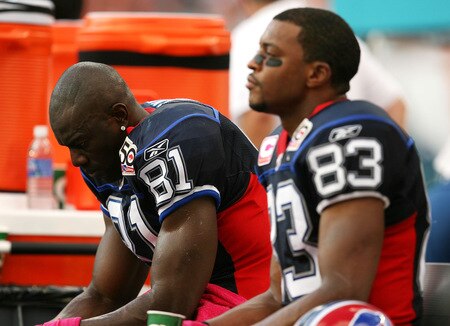 MIAMI - OCTOBER 04:  Wide receivers Terrell Owens #81 and Lee Evans #83 of the Buffalo Bills react on the bench late in the fourth quarter against the Miami Dolphins at Land Shark Stadium on October 4, 2009 in Miami, Florida. The Dolphins defeated the Bills 38-10.  <br /><br /><span class="help">(Photo by Doug Benc/Getty Images)</span>