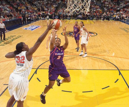 INDIANAPOLIS - OCTOBER 4: Temeka Johnson #2 of the Phoenix Mercury shoots over Ebony Hoffman #32 of the Indiana Fever during Game Three of the WNBA Finals at Conseco Fieldhouse on October 4, 2009 in Indianapolis, Indiana.  <br /><br /><span class="help">(Photo by Ron Hoskins/NBAE via Getty Images)</span>
