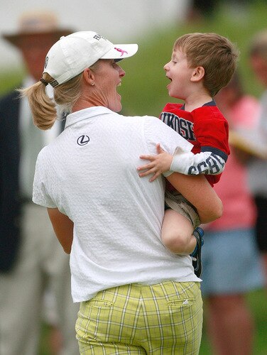 PRATTVILLE, AL - OCTOBER 4: Janice Moodie of Scotland is greeted by her son Craig following her final round play in the Navistar LPGA Classic at the Robert Trent Jones Golf Trail at Capitol Hill on October 4, 2009 in Prattville, Alabama. <br /><br /><span class="help">(Photo by Dave Martin/Getty Images)</span>