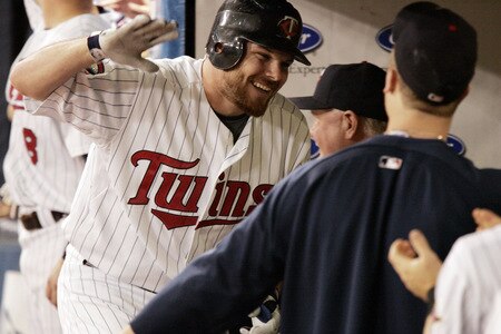 MINNEAPOLIS, MN - OCTOBER 4: Jason Kubel #16 of the Minnesota Twins celebrates with teammates after hitting a three-run home run against the Kansas City Royals in the third inning at Hubert H. Humphrey Metrodome on October 4, 2009 in Minneapolis, Minnesota. <br /><br /><span class="help">(Photo by Genevieve Ross/Getty Images)</span>