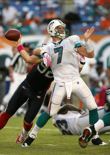 MIAMI - OCTOBER 04:  Defensive end Ryan Denney #92 of the Buffalo Bills causes quarterback Chad Henne #7 of the Miami Dolphins to fumble the ball in the fourth quarter at Land Shark Stadium on October 4, 2009 in Miami, Florida. The Dolphins defeated the Bills 38-10.  <br /><br /><span class="help">(Photo by Doug Benc/Getty Images)</span>