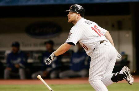 MINNEAPOLIS, MN - OCTOBER 4: Jason Kubel #16 of the Minnesota Twins watches as the ball heads to the stands, hitting a three-run home run against the Kansas City Royals in the third inning at Hubert H. Humphrey Metrodome on October 4, 2009 in Minneapolis, Minnesota. <br /><br /><span class="help">(Photo by Genevieve Ross/Getty Images)</span>